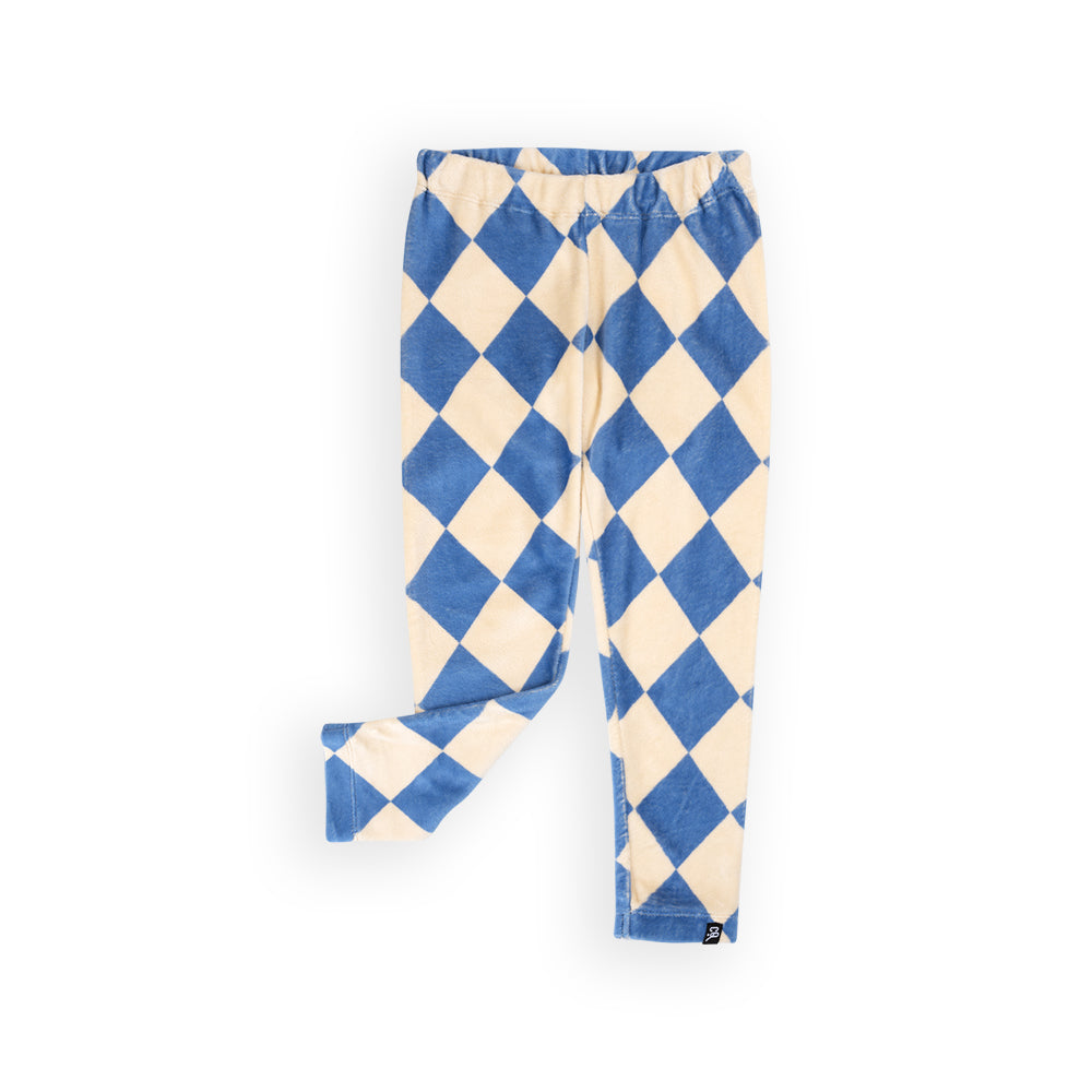 Een witte legging met een licht blauwe geblokte print in een zachte, velvet stof.